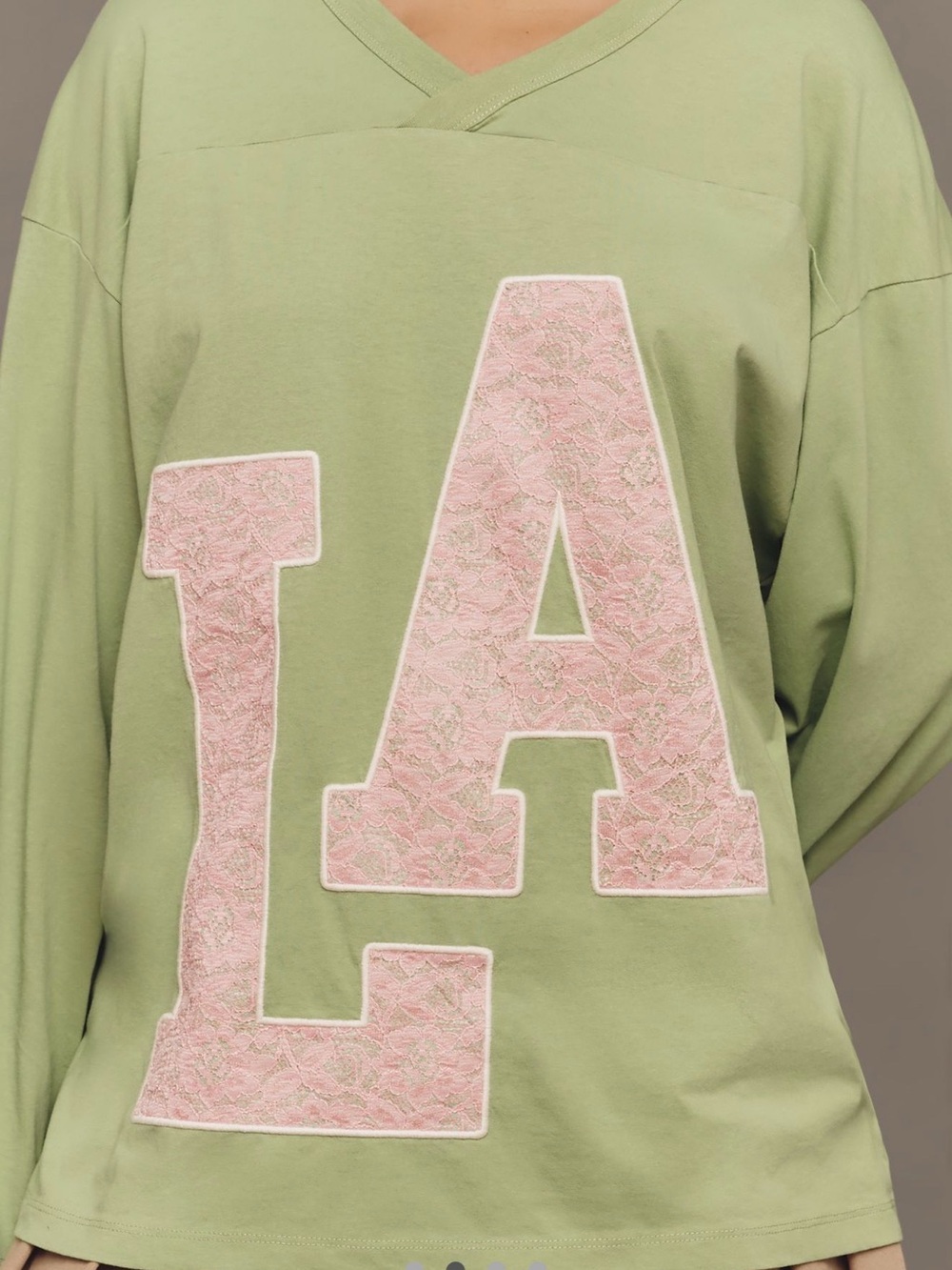 Anthropologie Green V-Neck Sweatshirt with Pink Lace 'LA' Appliqué